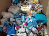 a cardboard box filled with many different types of items