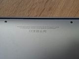 a close up of a laptop on a wooden table