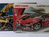 two boxed legos of a red sports car and a yellow truck
