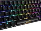 a close up of a computer keyboard with a colorful key board