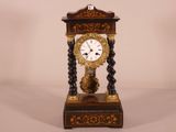 a clock that is sitting on top of a table