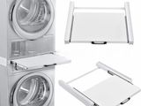 a white washer and dryer sitting next to each other on top of each other