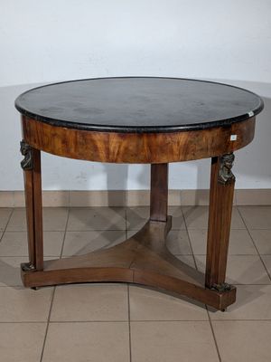 an image of a round table with a marble top