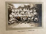 a group of men that are posing for a picture