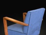 an image of a blue chair against a black background