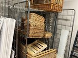 many baskets on the shelves in the room