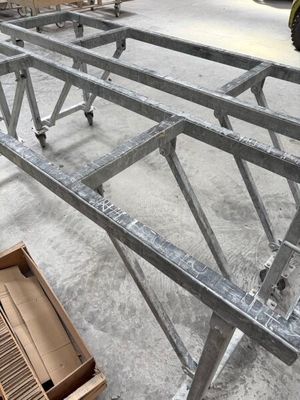 a large metal structure that is sitting in a warehouse