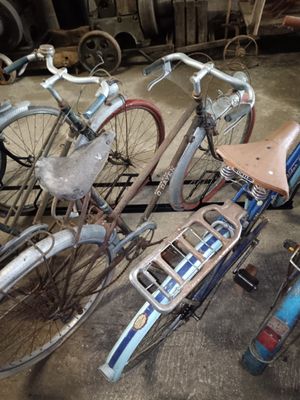 two bicycles that are parked next to each other in a garage
