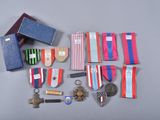 many medals and other items that are on the table