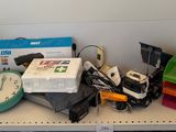 a desk with a bunch of office supplies on top of it