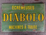 an old green and yellow sign with the words diabolo on it