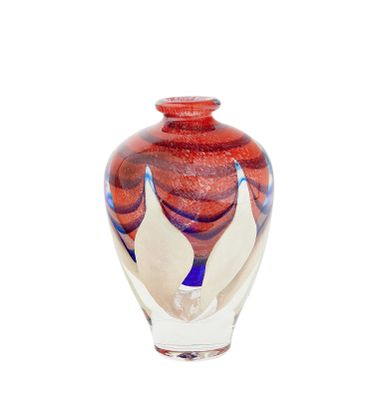 a glass vase with a red and white design on it