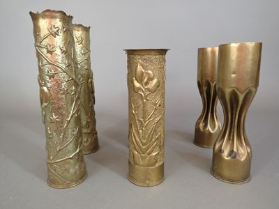 three vases sitting next to each other on a table