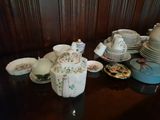 a table with a lot of plates and cups on it