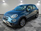 a blue fiat suv parked on a checkered floor in a garage