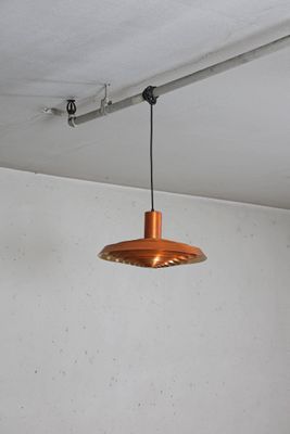 a light that is hanging from the ceiling in the room