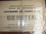 une affiche accrochée au mur sur laquelle on peut lire « cours de CEV UX »