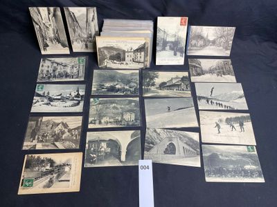 several old postcards of different types and sizes on a table