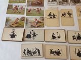 many pictures of people and animals on the table