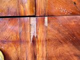 a banana sitting on top of a wooden table