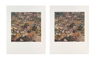 an aerial view of a city with a lot of buildings