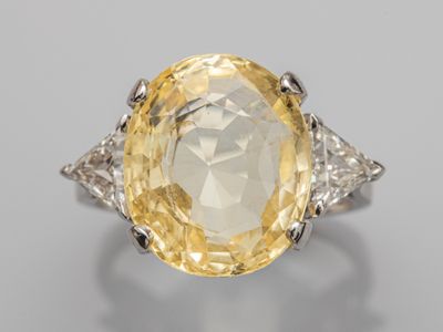 a yellow sapphire and diamond ring