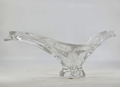 a clear glass vase with a curved design on it