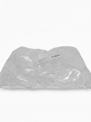 a plastic bag of food sitting on a white surface