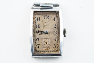 an image of an old watch with roman numerals