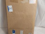 a cardboard box that is sitting on top of a white sheet