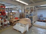 a room filled with lots of boxes and shelves