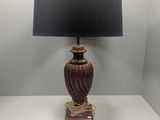 an image of a table lamp with a black shade on it