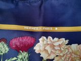 a picture of a bag with flowers and a name on it