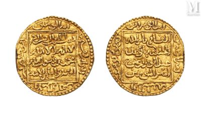 two gold coins with arabic writing on them