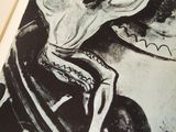 a black and white drawing of a man on a motorcycle