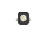 a close up of a ring on a white background