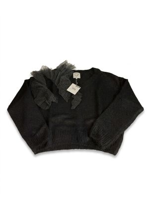 the sweater is black and has a tulle around the neck