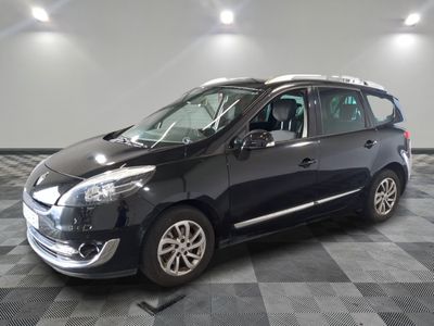 a picture of a black car parked in a garage