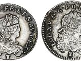 a silver coin with an image of a woman on it