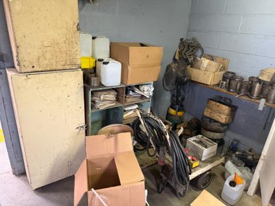 a room filled with boxes and other items in it