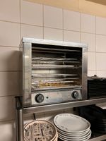 SALAMANDRE électrique à deux grilles, sans marque apparente.