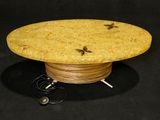 a table with a wooden base and a wire on top of it