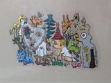 a drawing of a group of cartoon characters on a wall
