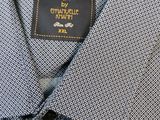 a close up of a shirt with a label on it