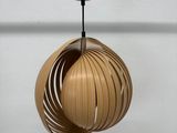 a close up of a light fixture hanging from a ceiling