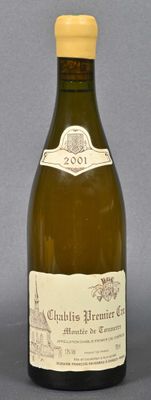 a bottle of wine that is sitting on a table
