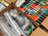 a cardboard box filled with many different types of items