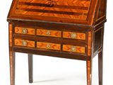 an antique writing desk with drawers and drawers on top of it