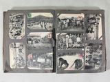 an old book with pictures of people and animals on it