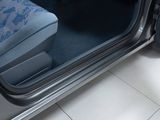 a car door open with a seat in it
